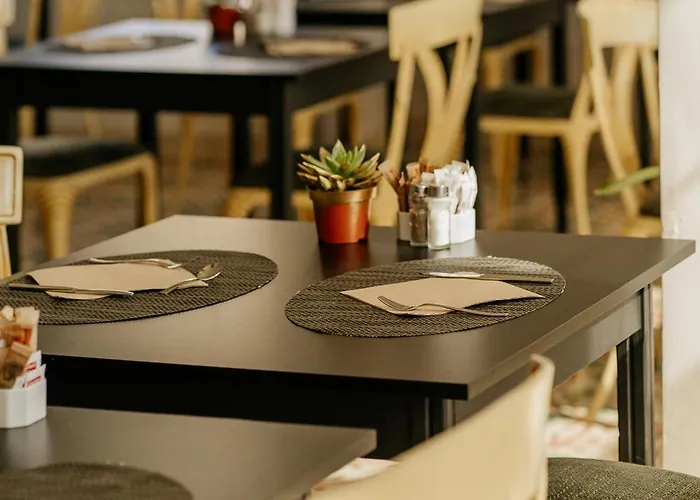 Reveron Plaza Отель